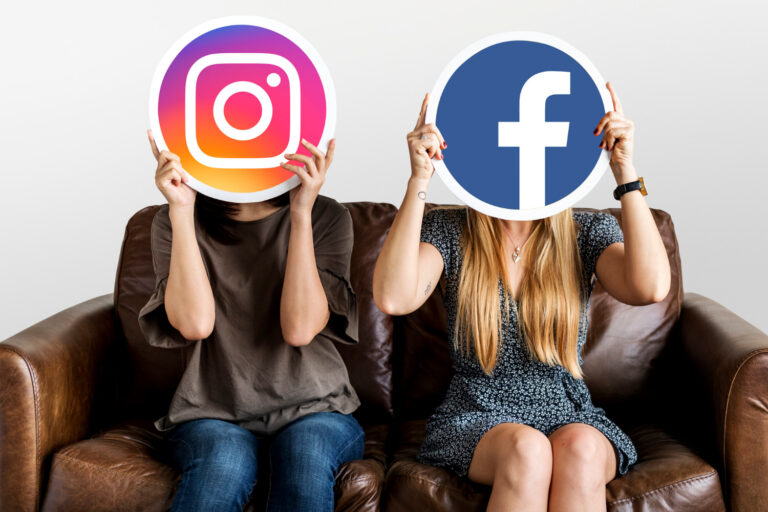 people-holding-social-media-icons