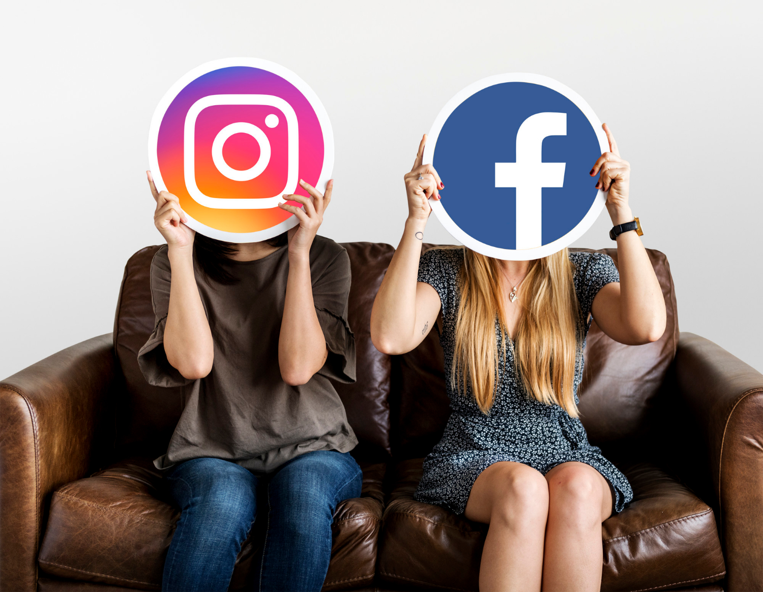 people-holding-social-media-icons